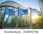 European union flag against parliament in Brussels, Belgium