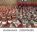 Small photo of Souvenir shops in Armenia.Grenades, dolls and glasses handmade with Armenian patterns.Armenia city of Yerevan Vernissage July 18, 2022.