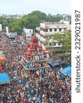 Small photo of Mahesh, 06-28-2023: thousands of devotees pulling multi-storied chariot of Lord Jagannath through crowded city street on the occasion of 627 years old Ratha Yatra, oldest chariot festival of Bengal.