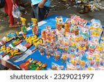 Small photo of Mahesh, 06-28-2023: small wooden toys of Lord Jagannath, brother Balaram and sister Subhadra, along with Shri Chaitanya Mahaprabhu are on display for sale on the occasion of Ulta Rath festival.