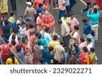 Small photo of Serampore, 06-28-2023: small children and their family members pulling stings of small chariots on the street, as they take part in 627 years old Ulta Rath festival of Bengal in Mahesh.