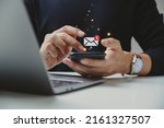 Hand of businessman using smartphone for email with notification alert, Online communication concept.