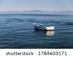 Small Fishing Boat On The Blue...