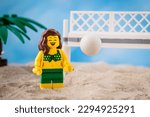 Small photo of Dortmund - Germany 2023 April 28 Lego Minifigure play beach volley