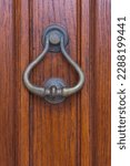 Antique Metal Door Knocker On A ...
