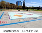 Small photo of San Jose, California - 2016: Monopoly in the Park - the Guinness Book of World Records record holder for world's largest permanent Monopoly board - in Discovery Meadow Park.