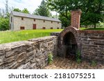 Small photo of Towson, Maryland -2022: Hampton National Historic Site. Long House Granary and outdoor fireplace. The two-story stone structure served as a hog barn and granary through the historic period.