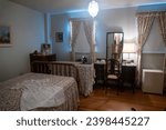 Small photo of Gettysburg, Pennsylvania -Aug 1, 2023: Eisenhower National Historic Site, home and farm of president Dwight D. Eisenhower. Maid's room. Rose Wood served as Mamie's personal maid.