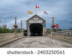 Small photo of Hartland, New Brunswick -Jun 1, 2023: The Hartland Covered Bridge is the world's longest covered bridge. It crosses the Saint John River from Hartland to Somerville, New Brunswick, Canada.