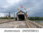 Small photo of Hartland, New Brunswick -Jun 1, 2023: The Hartland Covered Bridge is the world's longest covered bridge. It crosses the Saint John River from Hartland to Somerville, New Brunswick, Canada.