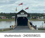 Small photo of Hartland, New Brunswick -Jun 1, 2023: The Hartland Covered Bridge is the world's longest covered bridge. It crosses the Saint John River from Hartland to Somerville, New Brunswick, Canada.