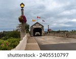 Small photo of Hartland, New Brunswick -Jun 1, 2023: The Hartland Covered Bridge is the world's longest covered bridge. It crosses the Saint John River from Hartland to Somerville, New Brunswick, Canada.