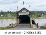 Small photo of Hartland, New Brunswick -Jun 1, 2023: The Hartland Covered Bridge is the world's longest covered bridge. It crosses the Saint John River from Hartland to Somerville, New Brunswick, Canada.