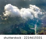 Aerial view of tranquil cloudscape in the blue sky with landscape ground below, nature wallpaper	