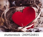 Small photo of Lent, Holy Week, Good Friday, Easter Sunday Concept - Crown of thorns with blurry red heart shape and stone background.