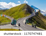 04.08.2018 . Grossglockner High Alpine Road . Austria. Tyrol. Europe. People on cars and motorcycles travel on mountain serpentine. Tourist destination, tourist attraction. Concept of autotourism.