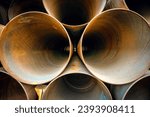 Small photo of abstract composition of petrochemical oil and gas pipelines. LNG. Natural gas pipeline. Piping and transmission of LNG through buried or subsea pipelines.