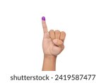 Small photo of Close up of hand gesture little finger after voting. General elections or Pemilu for the president and government of Indonesia. The finger dipped in purple ink. Isolated image on white background