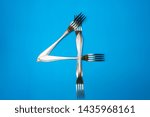 Small photo of four forks sake. four forks arranged in the shape of the number four. title is a play on words for a expletive.
