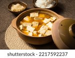 Small photo of Dry roasted tofu pot on sackcloth