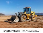 Bulldozer Or Loader Moves The...