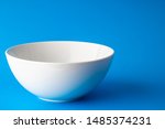 isolated white plate on a blue... | Shutterstock . vector #1485374231