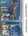 Small photo of Calgary, Alberta, Canada. Jun 10, 2023. An elevated perspective of 6th Avenue during the Calgary Stampede Parade from a superior vantage point.
