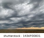 Storm clouds over Santa Fe Trail Tracks Dodge City, KS. May, 2019