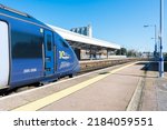 Small photo of Margate, Kent UK - May 1 2022: South Eastern High Speed service train at Margate Railway Station, you can see the station platform and Arlington House in the distance.