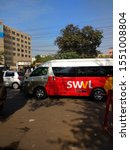 Small photo of SWVL vans is running on the road. The startup like SWVl and Airlift are becoming essential for the life in the city of Karachi Pakistan - Nov 2019