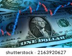 US dollar with a stock market index chart. Dollar rise concept. Economic recovery of the United States of America. US economic and financial recovery.