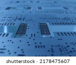 Small photo of Close-up macro shot of a laser cut stainless steel stencil for solder paste application of printed circuit boards (PCB) for surface mounted (SMT) electronic components