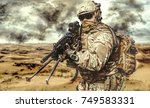 Small photo of Machine gunner in the desert in action