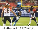 Small photo of Toronto, Canada - July 6, 2019: Toronto Argonauts Running back James Wilder Jr (32) running for a touch down during the BC lions at Toronto Argonauts game at BMO Field in Toronto, ON