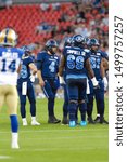 Small photo of Toronto, Canada - Aug 1, 2019: Toronto Argonauts Quarterback McLeod Bethel-Thompson (4) huddles his offence during Winnipeg Blue Bombers at Toronto Argonauts game at BMO Field in Toronto, ON