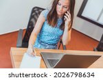 businesswoman is on her cell... | Shutterstock . vector #2026798634
