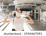 Small photo of Happy young adult business asian woman wear face mask for protect virus corona or covid19 and air pollution. Urban people lifestyle with public health on day concept.