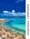Small photo of This is a summer seascape at Minna island in Okinawa Prefecture, Japan. Minna island is well known as a tourist destination in this prefecture, many people come to see beautiful scenery like this.