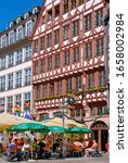 Small photo of Frankfurt Old City, Ostzeile. This row picturesque houses are reconstructions of the original 15th and 16th century houses. In March of 1944 bombardments obliterated the whole historic district. 2012
