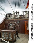 Small photo of Old galleon rudder or helm and deck