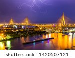 Small photo of Bhumibol Bridge is one of the most beautiful bridges in Thailand and area view for Bangkok with thunderclap. Name of bridge comes from the name of The king of Thailand. Translate text"Bhumibol Bridge"