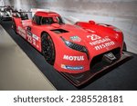 Small photo of Le Mans, France; October 10, 2023: Front view of the spectacular red 2016 Nissan GT-R LM Nismo, at the Le Mans museum