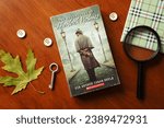Small photo of Lviv, Ukraine - November 17, 2023: Sherlock Holmes book by sir Arthur Conan Doyle. Victorian detective novels concept