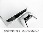 Next Generation game console and controller in close view