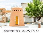 Small photo of One of Arabian Aarif fortress tower standing on the street of Hail, Saudi Arabia8