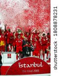 Small photo of Istanbul, TURKEY - May 25, 2005: Captain Steven Gerrard lifts the trophy at the ceremony following the UEFA Champions League final 2004/2005 AC Milan v Liverpool at the Ataturk Olympic Stadium.