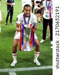Small photo of Turin, ITALY - May 21, 2022: Emelyne Laurent of Olympique Lyonnais celebrates with the trophy after the UEFA Women's Champions League Final Barcelona FC v Olympique Lyonnais at the Juventus Stadium.