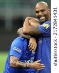 Small photo of MILAN, ITALY - MAY 23, 2022: Maicon hugs Wesley Sneijder during the Charity Football Match - Integration Heroes Match at San Siro Stadium.