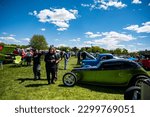 Small photo of Car enthusiasts look at vintage and antique cars at the Rhinebeck Car Show at the Dutchess County Fairgrounds in Rhinebeck, NY on Saturday, May 6, 2023.