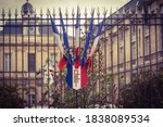 Small photo of Troyes, France - Oct. 18, 2020 - Flags of France on the coat of arms, flown at half-mast as a sign of national mourning in tribute to Samuel Paty, a teacher beheaded by an islamist terrorist